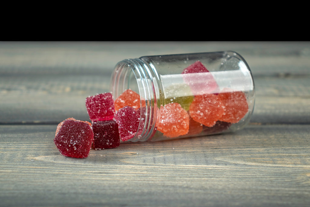 A jar contains cannabis edibles